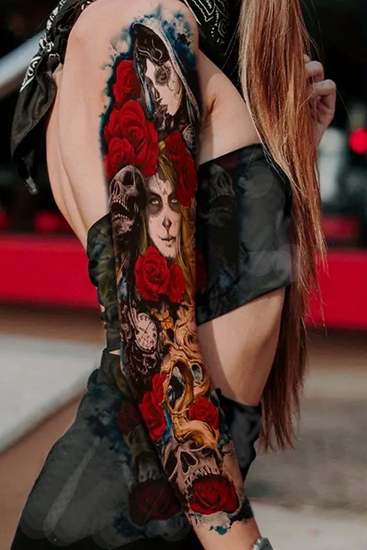 Skulls, clocks, and beautiful faces dressed for Mardi Gras Day of Dead masks. This full arm or leg sleeve celebrates the beauty of life with roses, and the skulls and clocks remind us of ticking time. The entire artwork is trimmed with heavenly clouds. Other features in this sleeve are arrows, bats, winding vines, and Monarch Butterflies. This tat will cover from shoulder to wrist or ankle to knee.