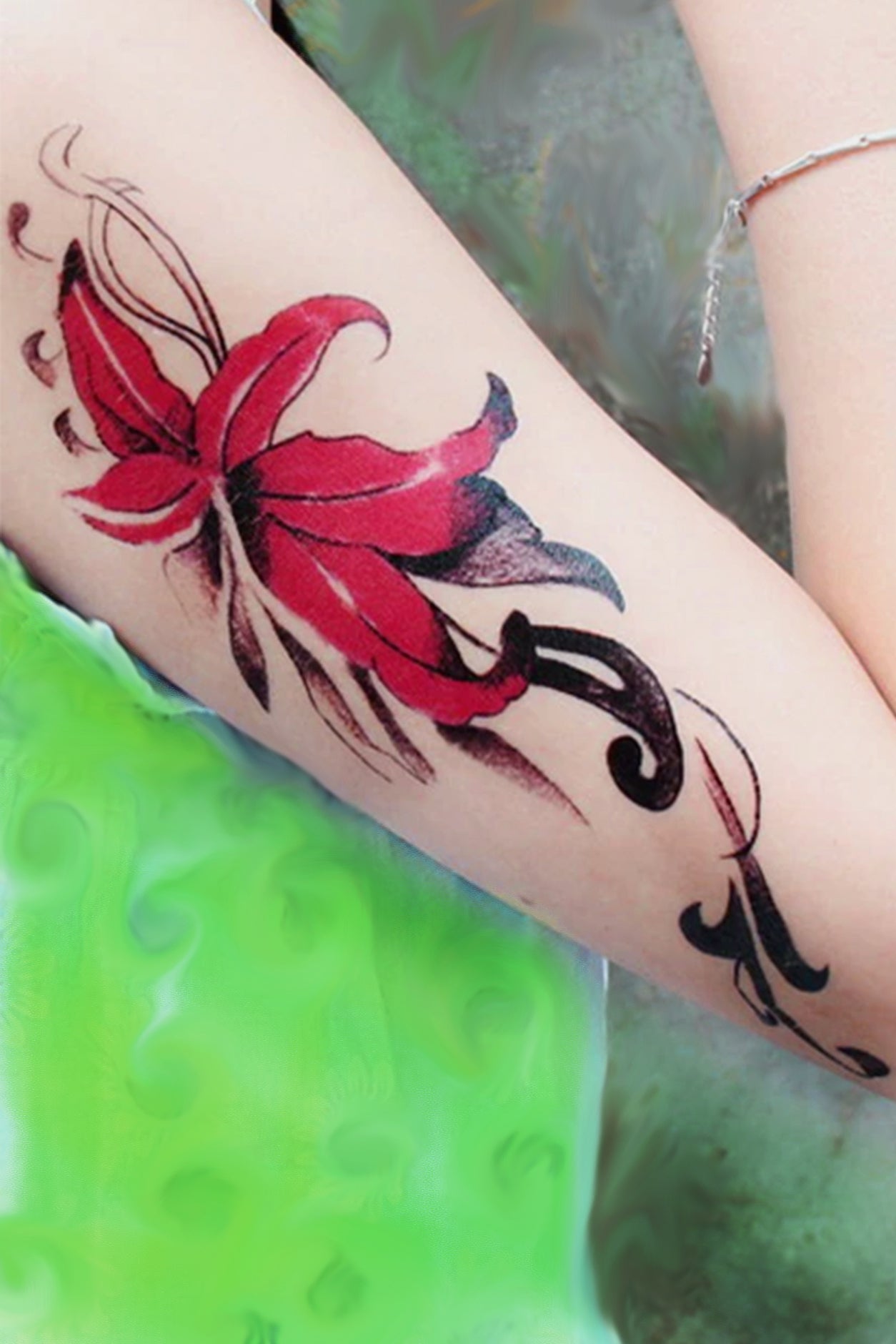 A young girls arm displays the rocking lily tattoo,