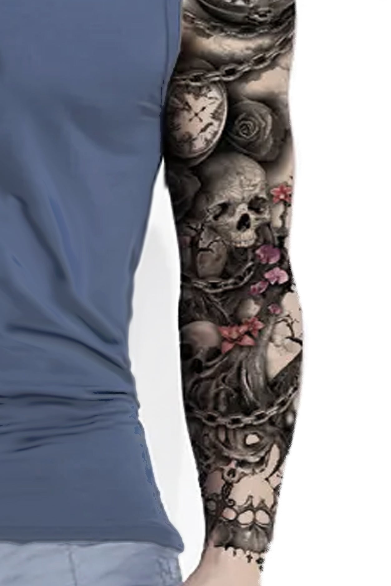 A guy in a light blue-grey shirt wears the skulls and chain, Tree of Life arm sleeve temporary tattoo.