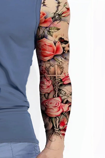 A male arm demonstrates the full arm sleeve, Pink roses wrap gentle vines around a white cross and assorted skulls in this beautiful representation of the appreciation of life. The background has Roman structures and a soft light blue hatching texture. Wear this artwork as a full arm sleeve, leg, or back tattoo.