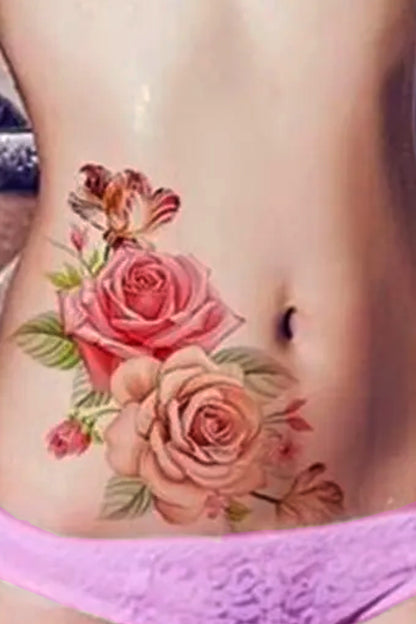 A girl displays her torso with roses. A delicate bouquet of lifelike pink and deep pink roses will beautify your arm, leg, torso, hip, or chest. The delicate rose capture light and shadow just right, the spray has tiny buds and leaves in the background at the right juxtaposition.
